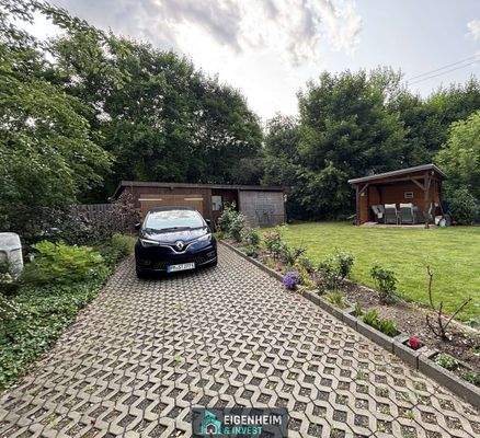 Garage und Überdachte Terrasse