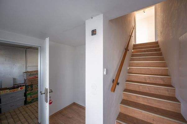 Aufgang in den 1. Stock