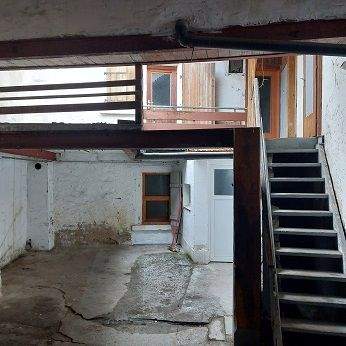 Treppe vom OG zum Innenhof und der Scheune