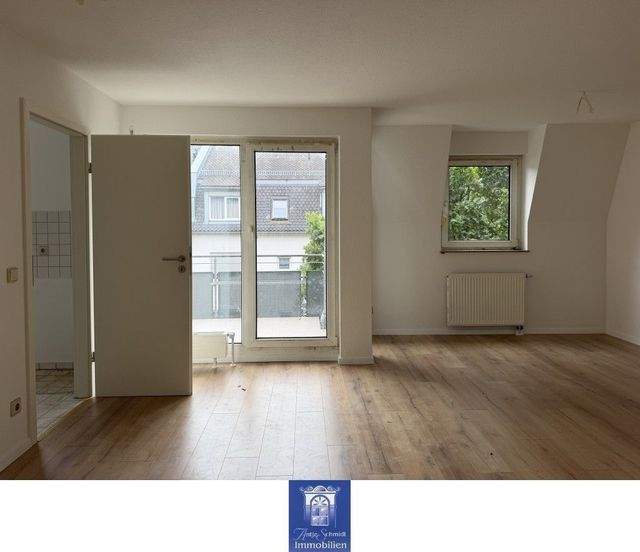 Eindrucksvolle Wohnung mit Balkon in gepflegter Umgebung! - Foto 1