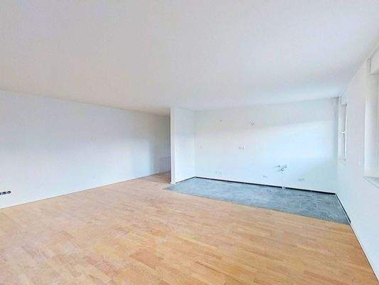 Ansicht IV: Wohn- und Esszimmer mit offenem Küchenbereich