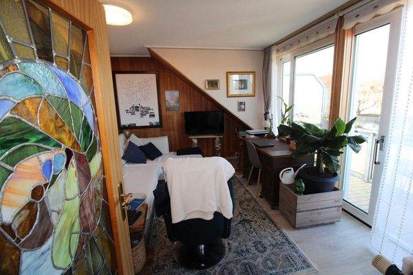 14 - Wohnzimmer mit Süd-West Balkon