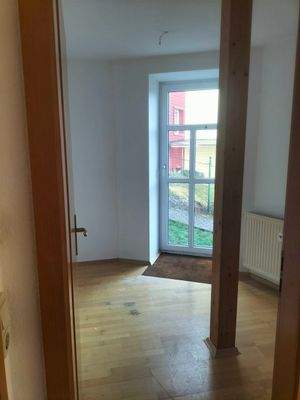 Zimmer mit Zugang zum Garten