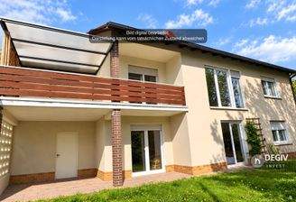 Gartenseite mit Balkon Bild di