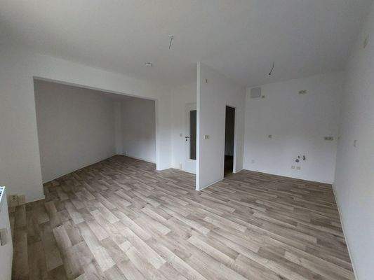 Wohnzimmer mit Küchenbereich