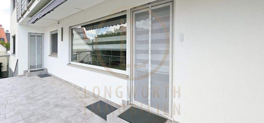 6-MFH-Garatenseite-Terrasse-EG