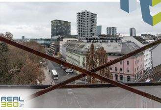 Ausblick vom Wohnzimmer auf den Volksgarten