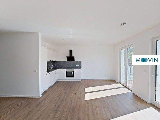 Ansicht III: Wohn- und Esszimmer mit offenem Küchenbereich