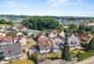Ansicht Haus mit Umgebungsbebauung
