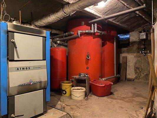 Holzheizung mit Wasserspeicher