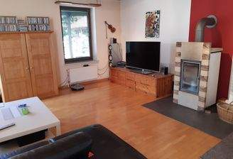 Wohnzimmer mit gemütlichem Kaminofen