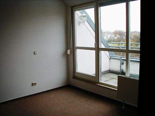 Schlafzimmer mit Balkon