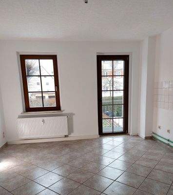 Küche mit Balkontür zum Garten 