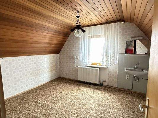 Eines von zwei Zimmern im DG