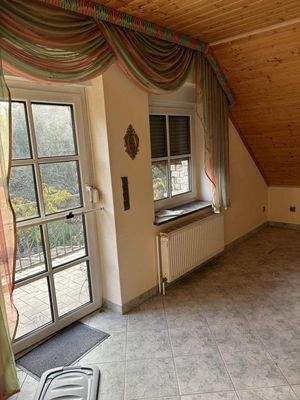 Schlafzimmer mit Balkon