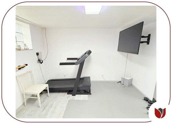 Fitnesszimmer im Untergeschoss