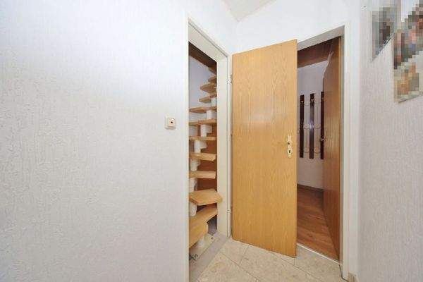 Treppe zum ausgebauten Dachgeschoss