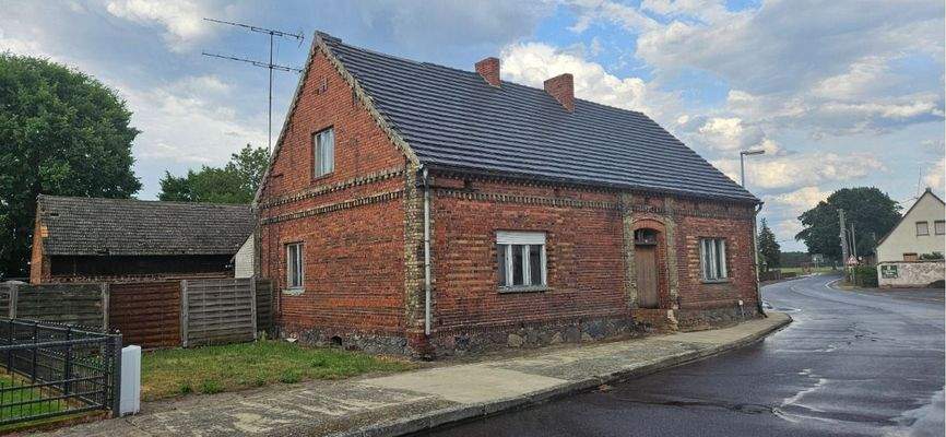 Baugrundstück mit Einfamilienhaus