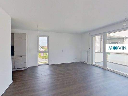 Ansicht II: Wohn- und Esszimmer mit offenem Küchenbereich