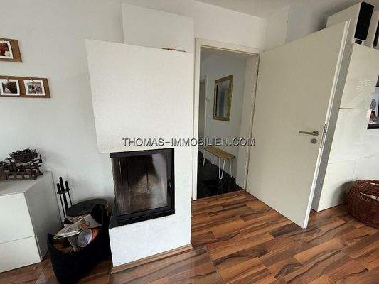 Wohnzimmer mit Kamin