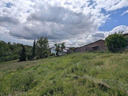 Wohnbauland mit Abrissgebäuden in Meisheide