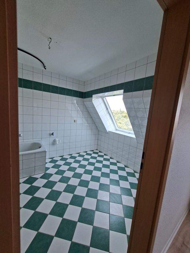 Helle 2-Raum-Dachgeschosswohnung mit großzügigem Wohnbereich - Foto 3