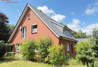 Einfamilienhaus mit 2 Wohneinheiten und Garage mit Werkstatt