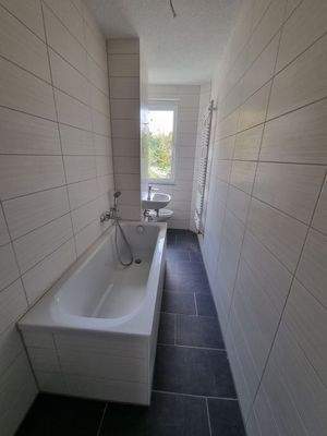 Muster - Badezimmer mit Wanne