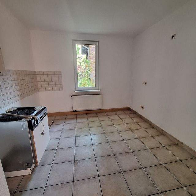Charmante 2-Raum-Wohnung im Erdgeschoss mit grünem Innenhof - beliebte Lage nahe der Saale - Foto 1