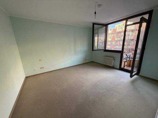 Schlafzimmer mit Balkonzugang