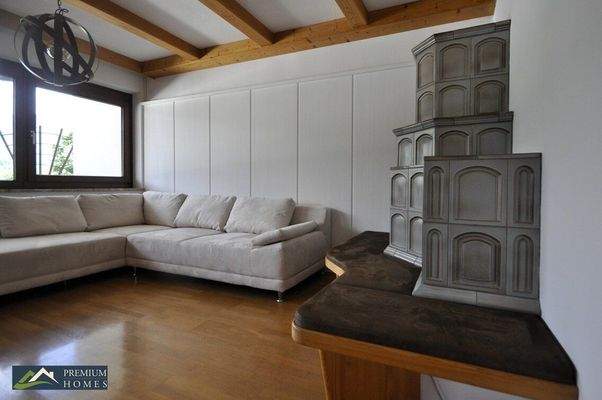 Gemütliche Etagenwohnung - Wohnzimmer mit Kachelofen