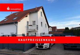 KI-generiert: DHH mit 2 Stellplätzen