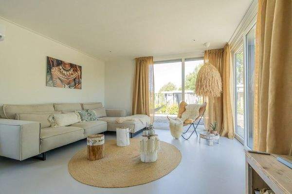 Wohnzimmer Chalet Schouwen Duin Schiebetür Garten 