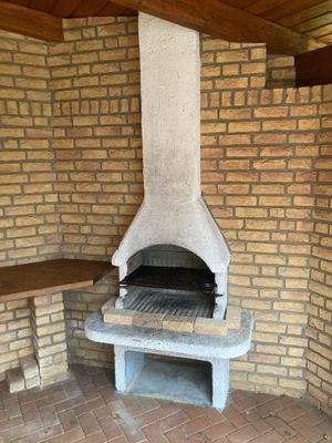 Grill unter Terrassendach