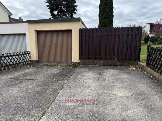 Garage und Einzelstellplatz