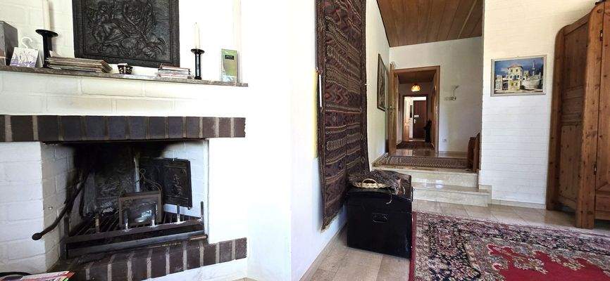 Kamin vor dem Wintergarten