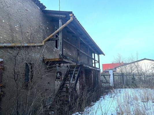 Nebengebäude mit Laubengang