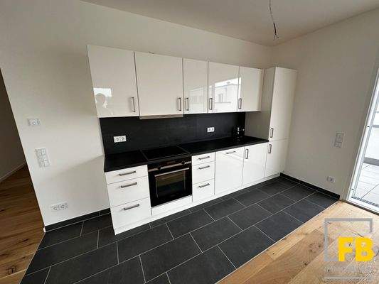 Moderne Einbauküche mit Markengeräten