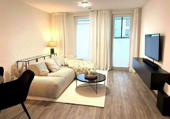 Wohnzimmer mit Balkon