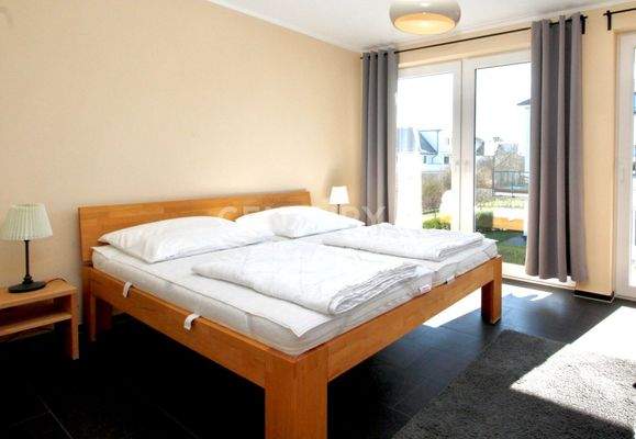 Schlafzimmer mit Balkonzugang