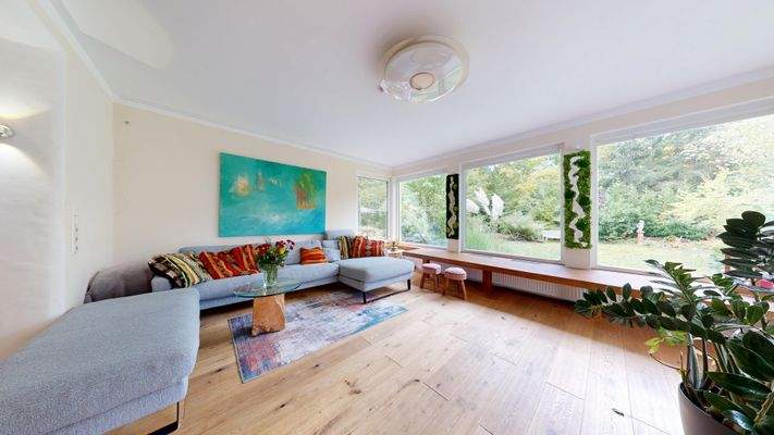 Wohnzimmer mit Wintergarten