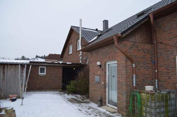 Ansicht Nord mit Zugang zu WE EG und OG