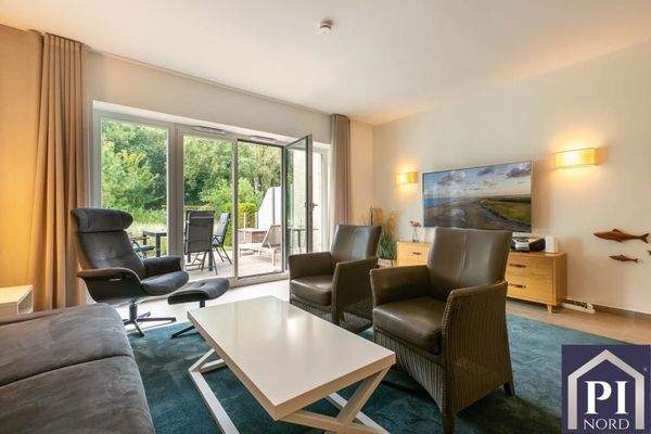 Wohnzimmer mit angrenzender Terrasse