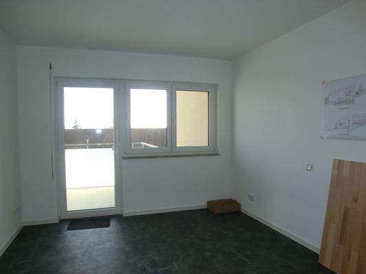 Schlafzimmer mit Balkonausgang