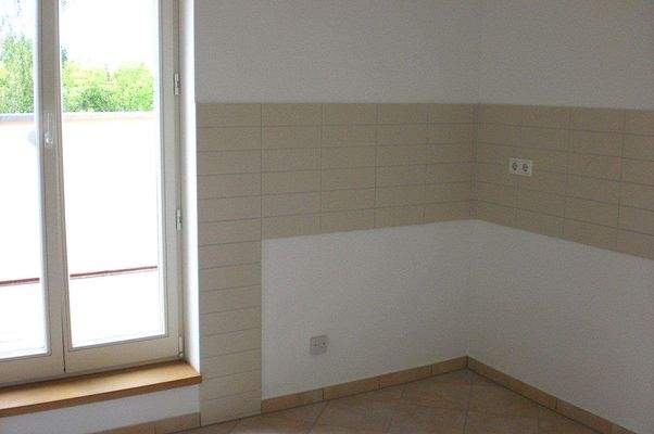 Küche mit Zugang zum Balkon