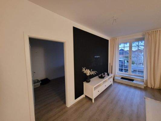 11 WZ mit Blick auf Extrazimmer.jpg