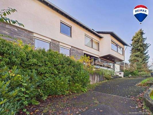 RE/MAX Immobilien DeLux Wohn-Geschäftshaus Merzig 