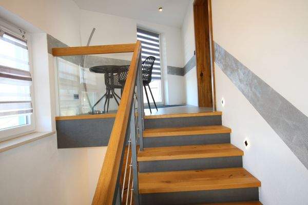 Treppe ins Obergeschoss