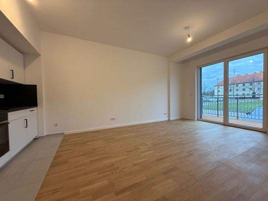 Wohnzimmer mit Küche