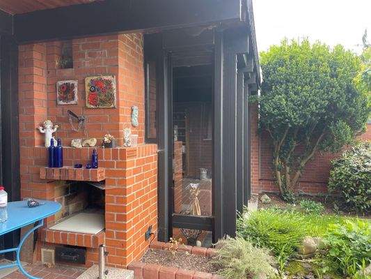 Aussenkamin an der Süd-Terrasse